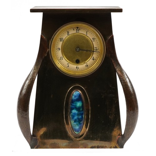 7 - Arts & Crafts copper mantle clock with inset Ruskin type cabochon, the movement impressed Rex, 31cm ... 
