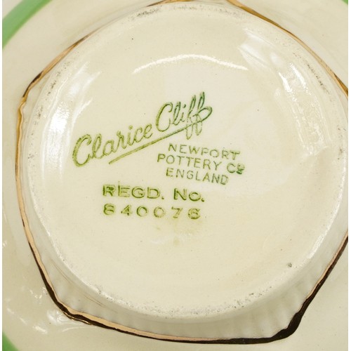 316 - Clarice Cliff, Art Deco Newport Pottery teaware hand painted and gilded with stripes comprising five... 