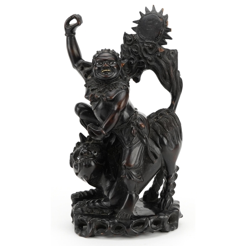 198 - Chinese root carving of a mythical figure and animal, 39cm high