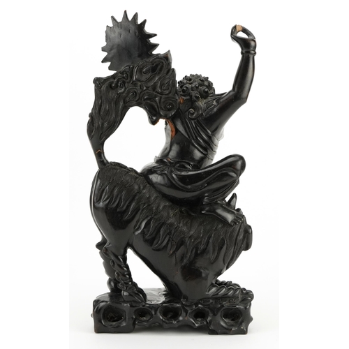 198 - Chinese root carving of a mythical figure and animal, 39cm high