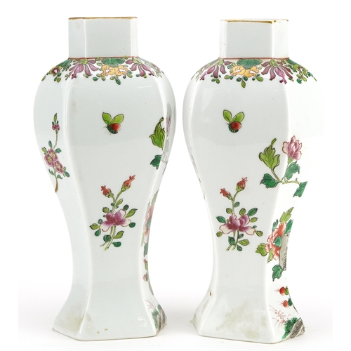 55 - Pair of Chinese porcelain hexagonal vases hand painted in the famille rose palette with flowers, eac... 
