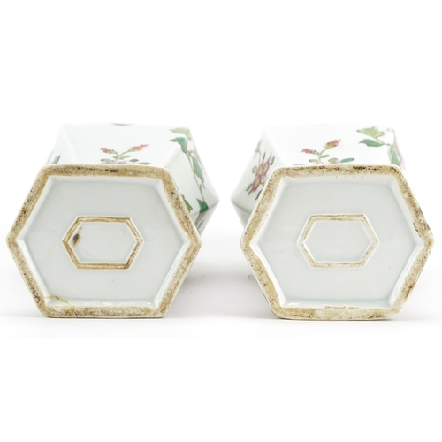 55 - Pair of Chinese porcelain hexagonal vases hand painted in the famille rose palette with flowers, eac... 