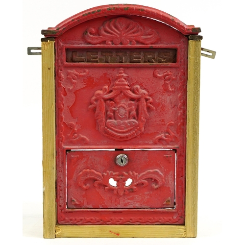 1241 - Wooden framed painted cast iron letter box, 45cm high x 30cm wide