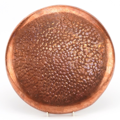 90 - Newlyn, Arts & Crafts beaten copper circular tray, impressed Newlyn, 33.5cm in diameter