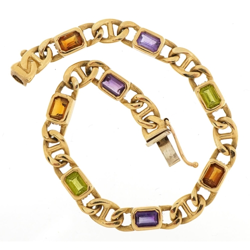 2125 - 9ct gold curb link design bracelet set with purple, green and orange stones, 17.5cm in length, 12.4g