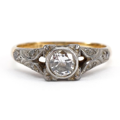 2080 - 18ct gold and platinum diamond ring with diamond set shoulders, the central diamond approximately 4.... 