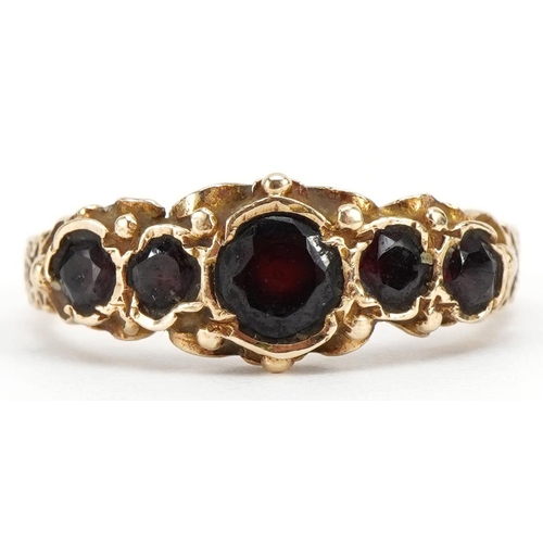 2074 - Victorian style 9ct gold garnet five stone ring, size P, 2.7g