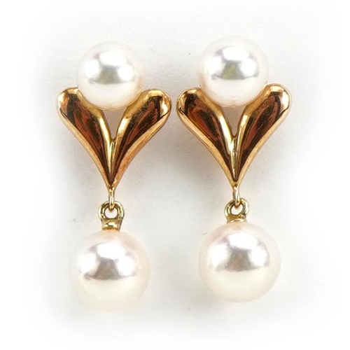 2592 - Pair of 14k gold Mikimoto pearl drop earrings housed in a Mikimoto Ginza, Tokyo box, 2.2cm high, 3.3... 