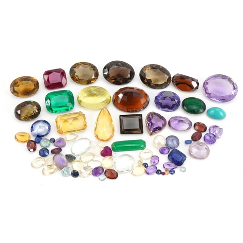 2619 - Collection of loose gemstones including amethyst, smoky quartz, citrine and opal love hearts, the la... 