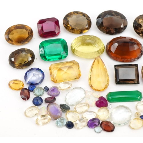 2619 - Collection of loose gemstones including amethyst, smoky quartz, citrine and opal love hearts, the la... 