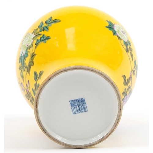 436 - Chinese yellow ground porcelain baluster vase and cover hand painted in the famille rose palette wit... 