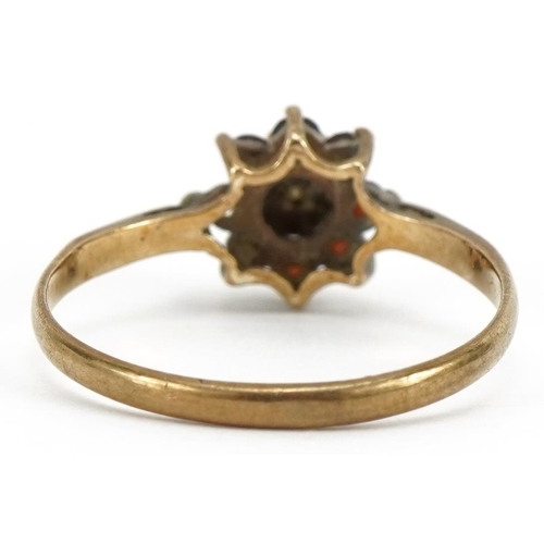 2120 - 9ct gold garnet and diamond flower head ring, Birmingham 1975, size L, 1.3g