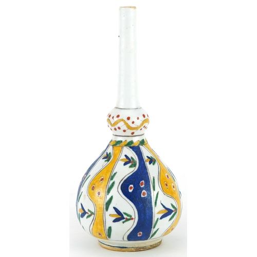 208 - Turkish Armenian pottery rosewater sprinkler hand painted with flowers, 22cm high