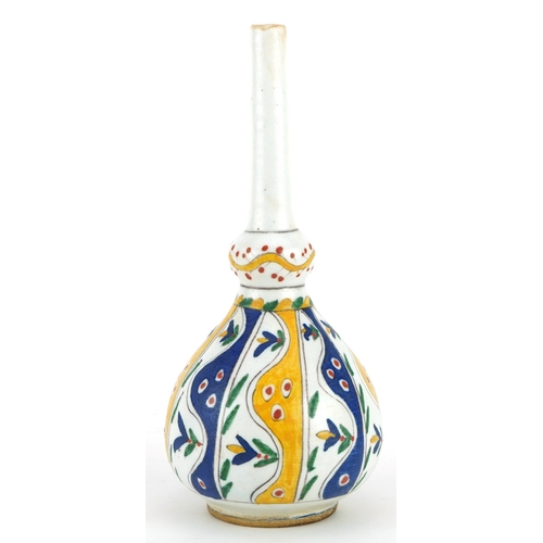 208 - Turkish Armenian pottery rosewater sprinkler hand painted with flowers, 22cm high