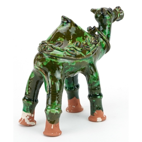 138 - Turkish Canakkale pottery camel ewer, having a green glaze, 19cm in length