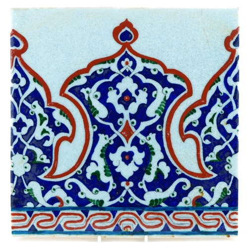 206 - Turkish Ottoman Iznik pottery tile hand painted with stylised flowers, 27.5cm x 27.5cm