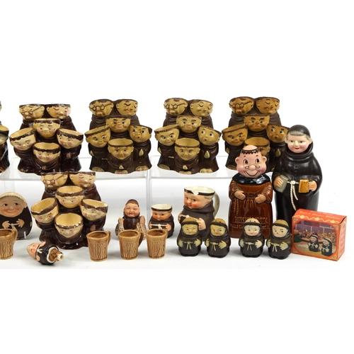 1442 - Collection of monk design decanters, egg cups and figures including Goebel,  the largest 22cm high