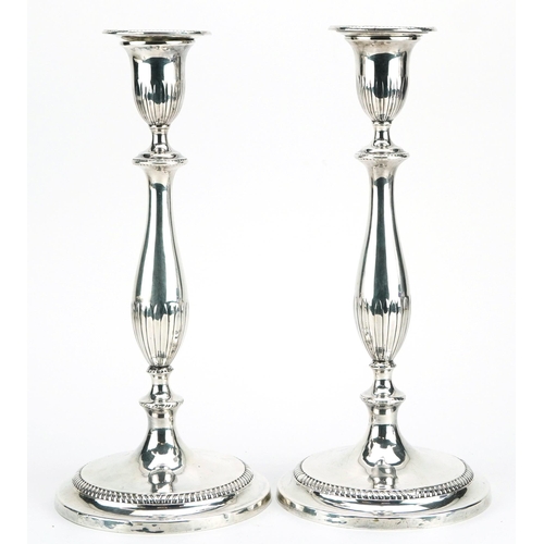 1881 - Pair of Georgian silver plated tapering candlesticks, 32cm high