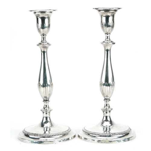 1881 - Pair of Georgian silver plated tapering candlesticks, 32cm high