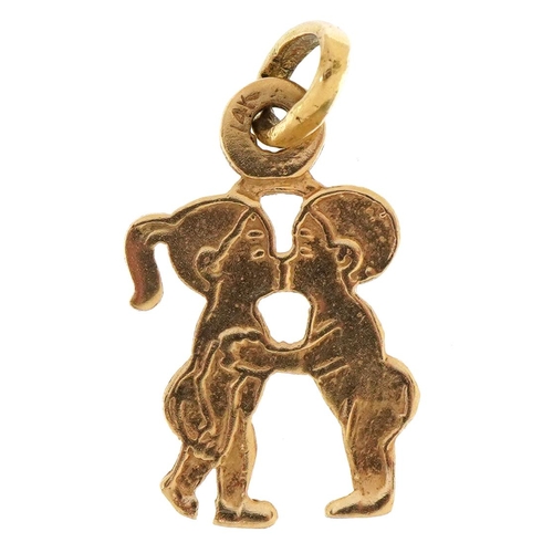 2583 - 14k gold boy and girl charm, 2.1cm high, 1.3g