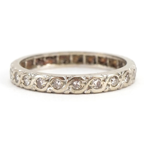 2117 - Unmarked white metal diamond eternity ring, size K, 2.1g