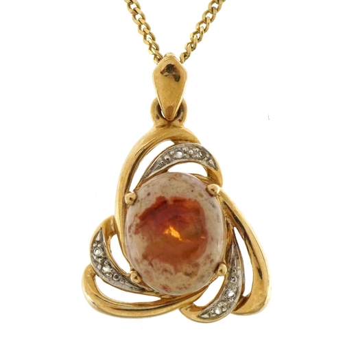 2114 - 9ct two tone gold cabochon orange stone pendant set with clear stones on a 9ct gold curb link neckla... 