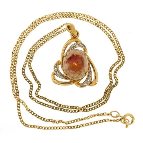 2114 - 9ct two tone gold cabochon orange stone pendant set with clear stones on a 9ct gold curb link neckla... 