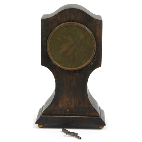 214 - Edwardian inlaid mahogany mantle clock, the enamelled dial having Arabic numerals, 25cm high