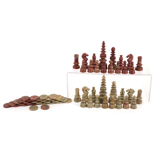 1404 - Chinese carved soapstone chess set and draughts pieces housed in a pine box, the largest pieces 10.5... 