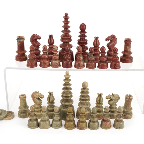 1404 - Chinese carved soapstone chess set and draughts pieces housed in a pine box, the largest pieces 10.5... 