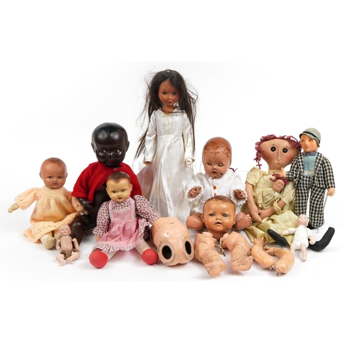 1449 - Eight vintage composite and cloth dolls with jointed limbs and two miniature bisque baby dolls, the ... 