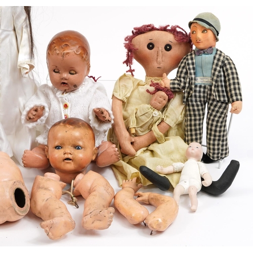 1449 - Eight vintage composite and cloth dolls with jointed limbs and two miniature bisque baby dolls, the ... 