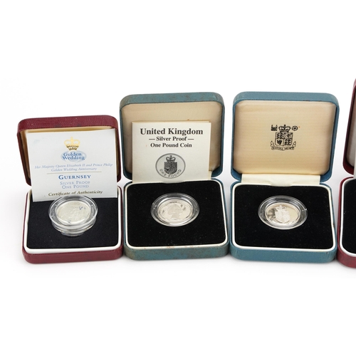 1885 - Six silver proof coins with fitted cases including D Day commemorative fifty pence coin and United K... 