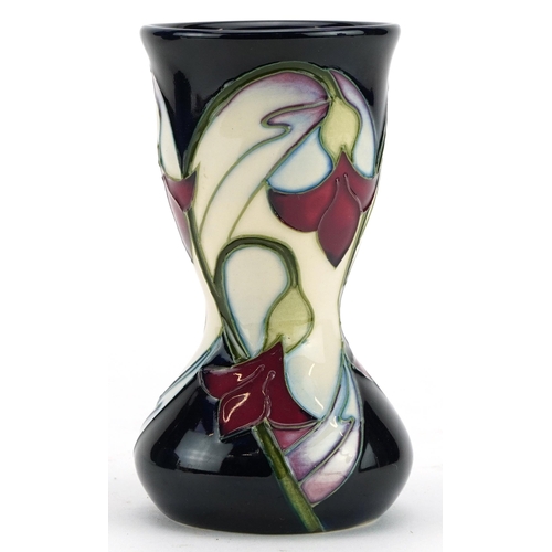 248 - Moorcroft pottery vase hand painted with stylised flowers, dated 2006, with box, 11cm high