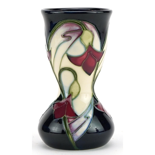 248 - Moorcroft pottery vase hand painted with stylised flowers, dated 2006, with box, 11cm high