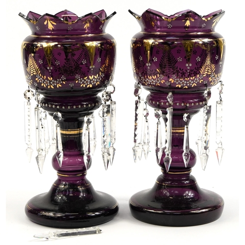 299 - Pair of Bohemian purple glass lustre vases with cut glass drops and jewelled decoration, each 37.5cm... 