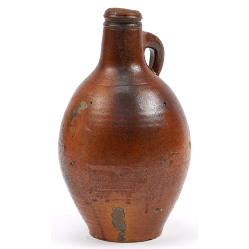 453 - Antique salt glazed Bellarmine jug, 29cm high