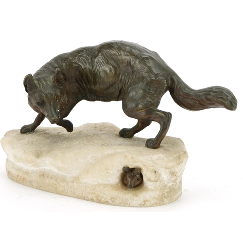 346 - Charles Masson, patinated bronze study of a fox and rabbit raised on an onyx base, 22cm wide