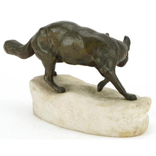 346 - Charles Masson, patinated bronze study of a fox and rabbit raised on an onyx base, 22cm wide