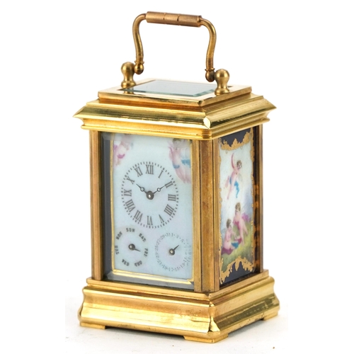 220 - Miniature brass carriage clock with Sevres type panels and Roman numerals, 8.5cm high