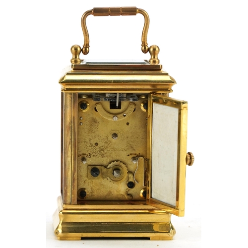 220 - Miniature brass carriage clock with Sevres type panels and Roman numerals, 8.5cm high