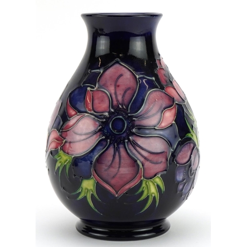 247 - Moorcroft Pottery baluster vase hand painted with flowers hand painted with flowers, 19.5cm high