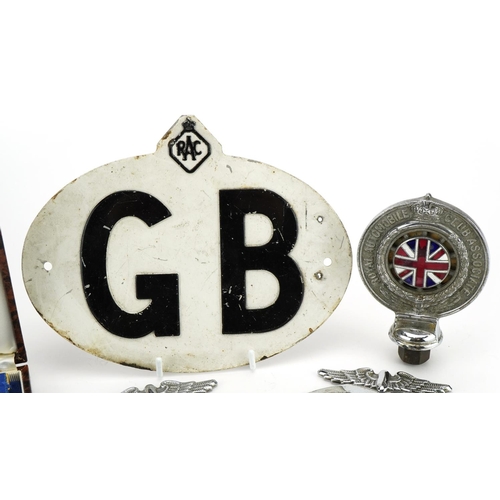 464 - Auto memorabilia comprising a silver gilt The Royal Automobile Club jewel with ribbon and box, two A... 