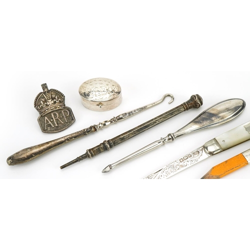 1865 - Silver objects including propelling pencils, ARP badge and a silver and mother of pearl folding pock... 