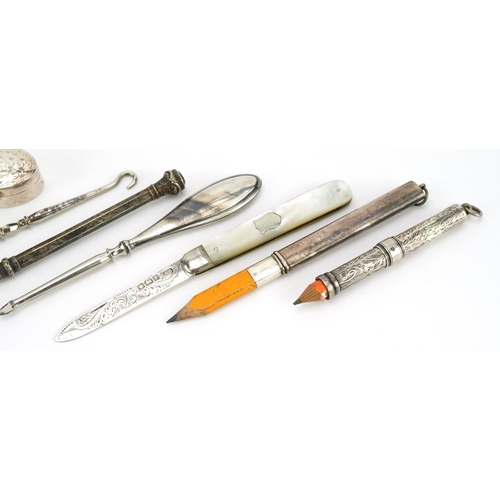 1865 - Silver objects including propelling pencils, ARP badge and a silver and mother of pearl folding pock... 