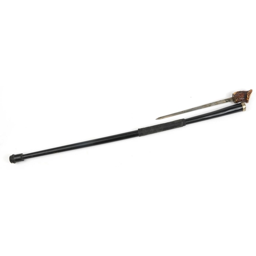 398 - Ebonised swordstick with horn handle and steel blade, 97.5cm in length