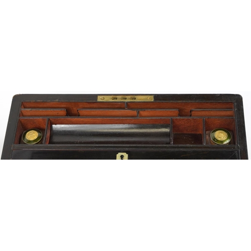 238 - Victorian burr walnut and coromandel brass bound writing slope with fitted interior having glass ink... 