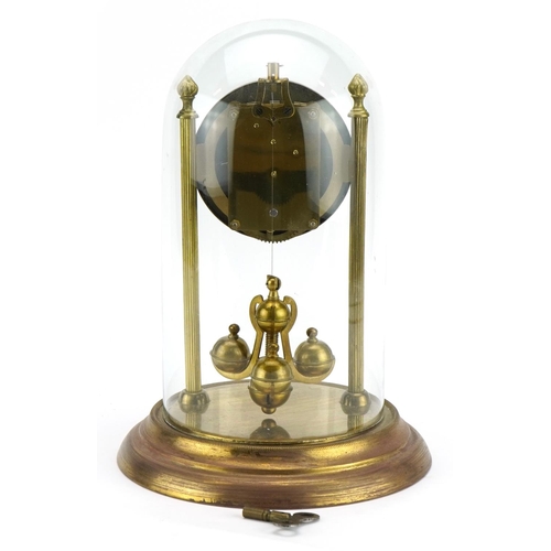 1643 - Brass anniversary clock under glass dome. 28cm high