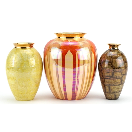 323 - Atkinson Jones, three contemporary lustreware vases including one having an orange dripping glaze, t... 