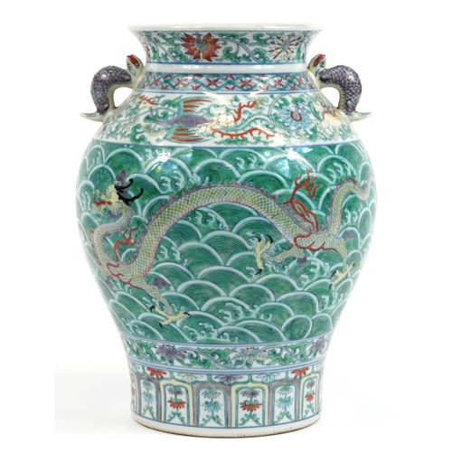 377 - Large Chinese doucai porcelain vase with twin animalia handles, hand painted with dragons chasing th... 